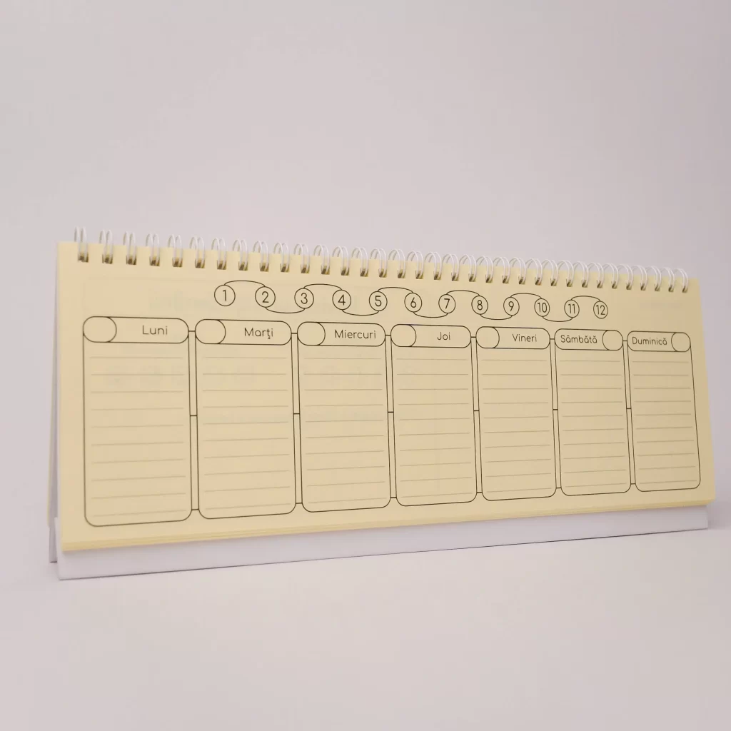 Detaliu al paginilor unui planner săptămânal nedatat